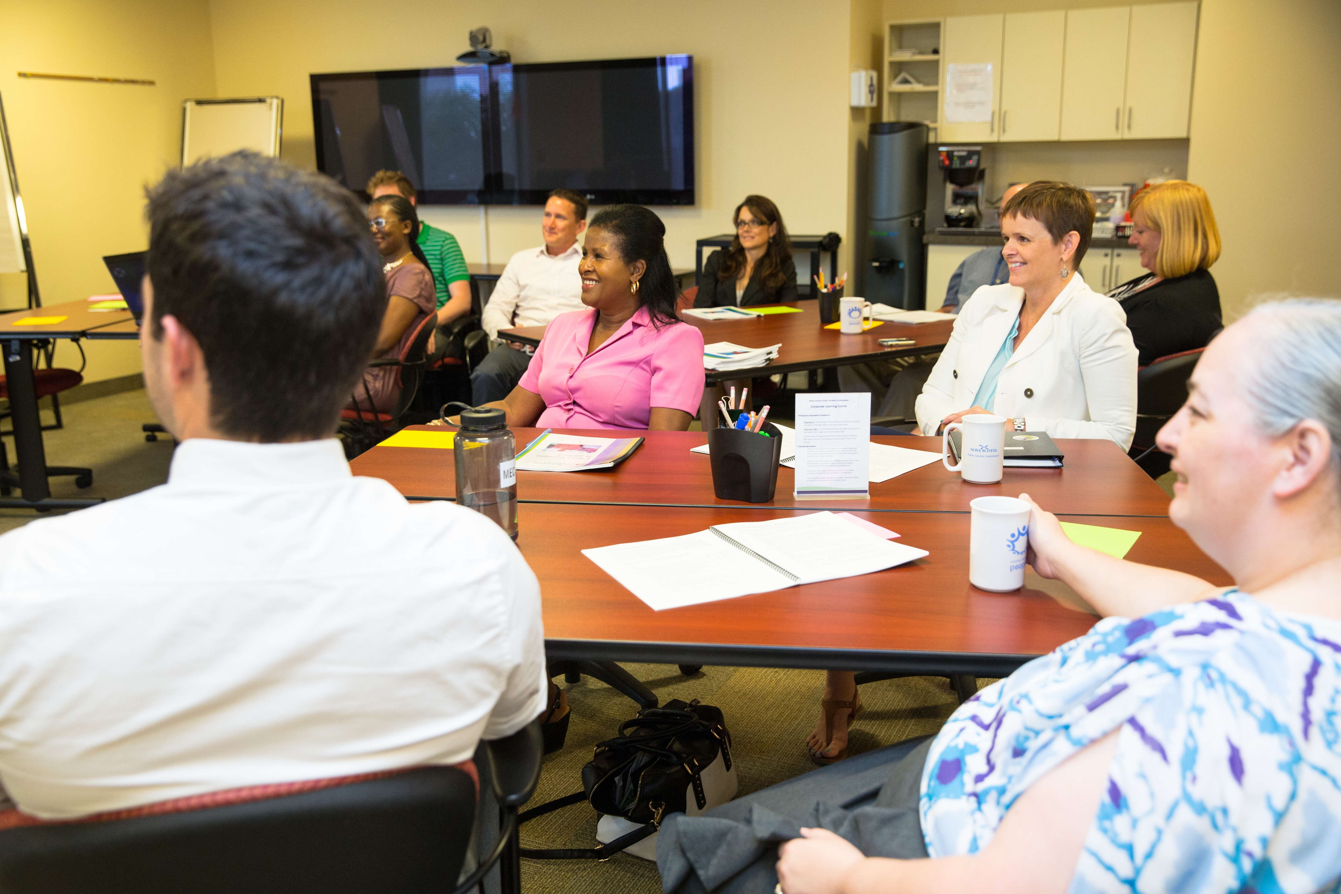 Group of adults in a meeting room
