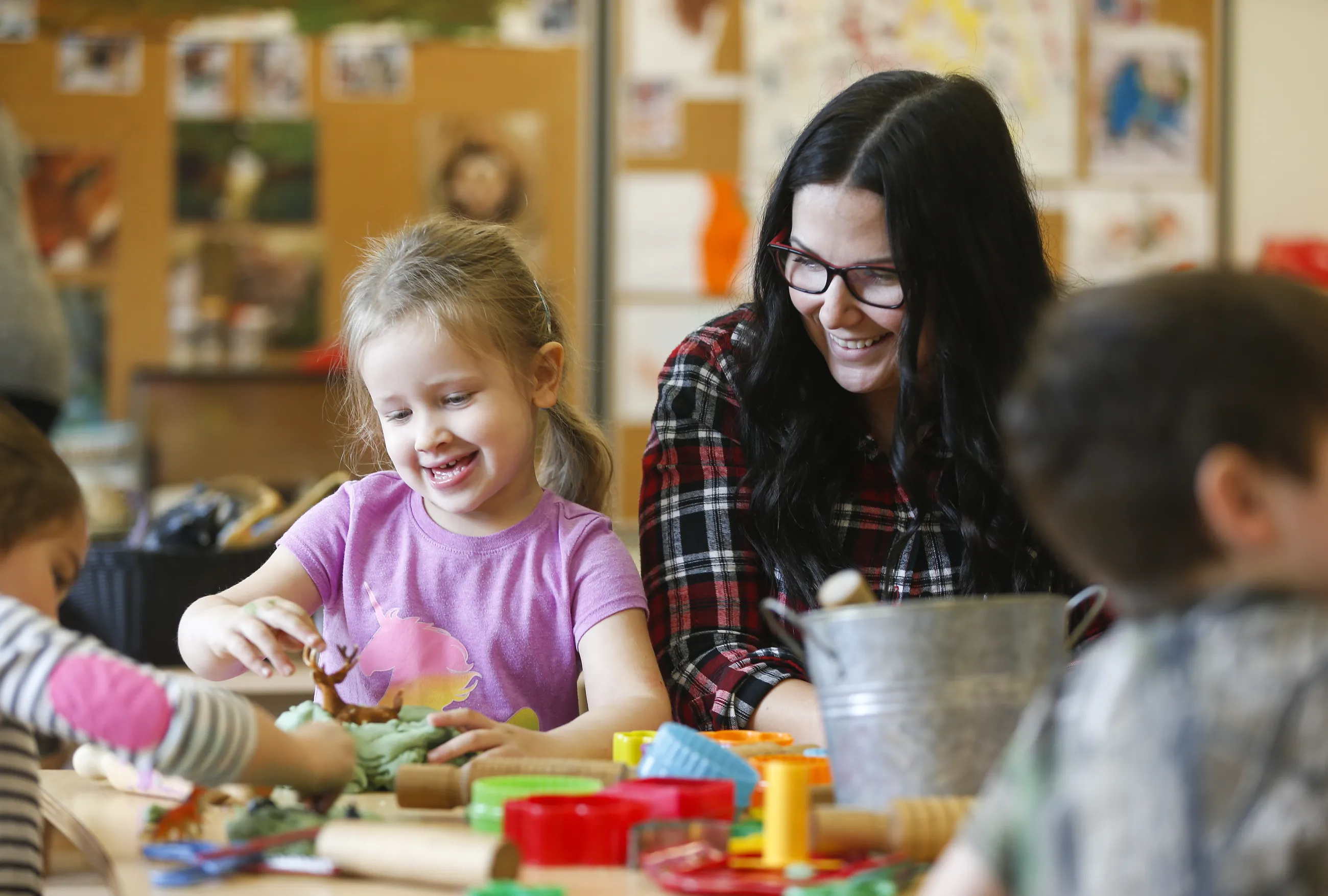 Children creating art in a daycare setting